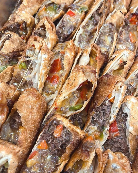 Steak and cheese eggrolls with marinara